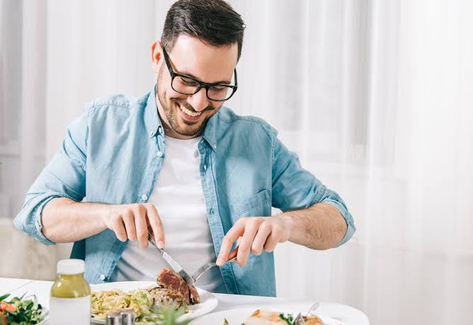 How Each Zodiac Sign Man Likes To Spend A Fun Evening men eat good food